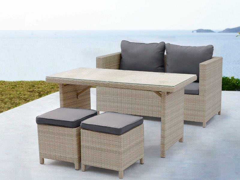 4-piece wicker outdoor dining set with blue cushions