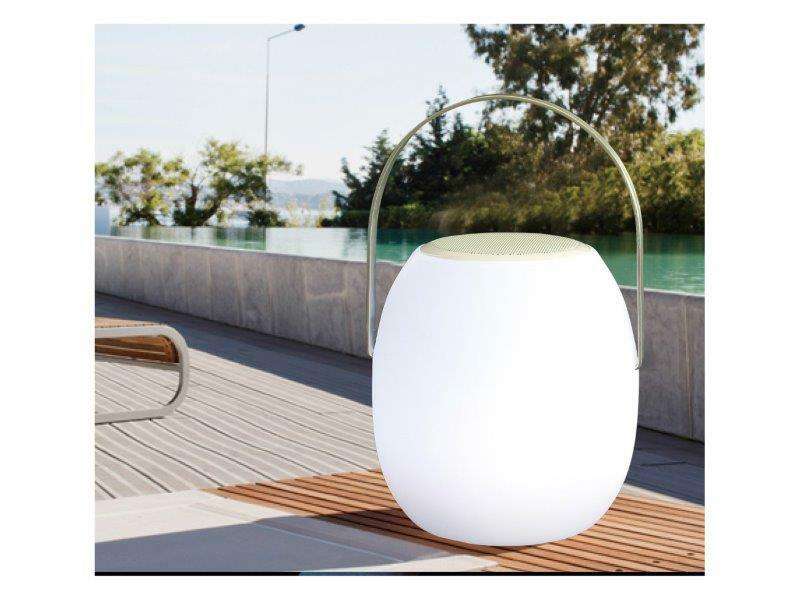 white portable LED speaker by a pool