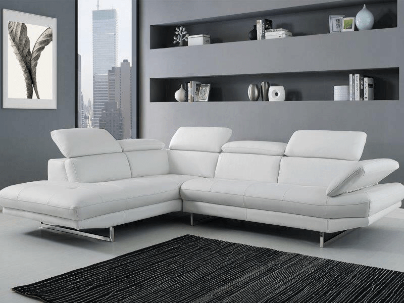 white leather sectional in a grey living room